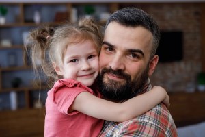 Man holding his daughter